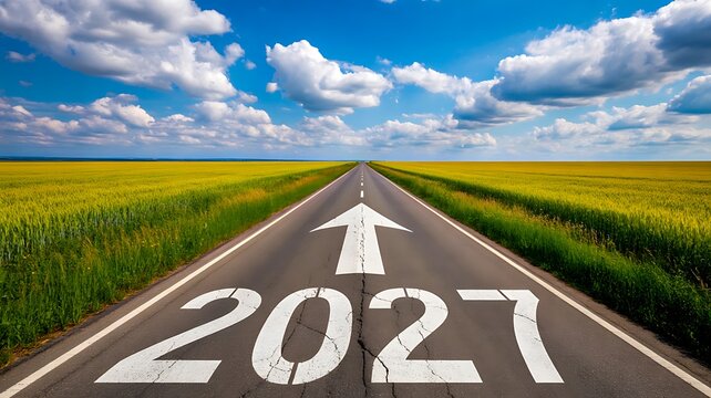 Future success road with 2027 arrow direction on highway under blue sky