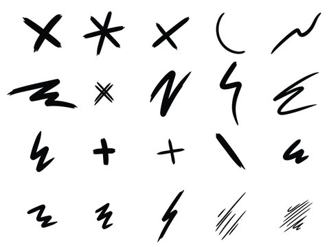 Collection of abstract black brush strokes and scribble marks on a white background