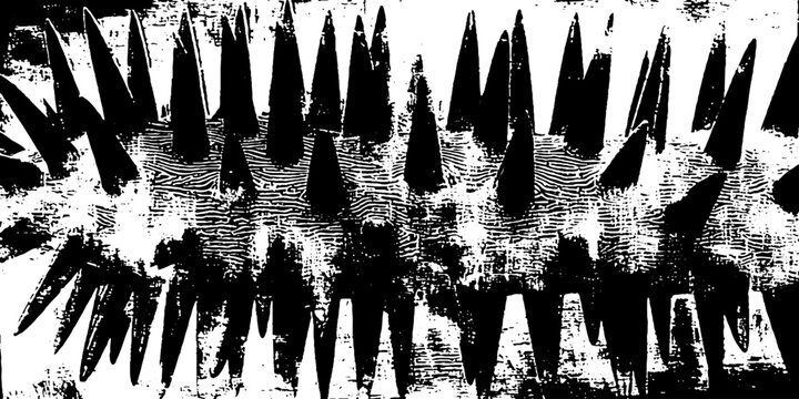 Row of spiked metal studs on distressed wooden surface closeup