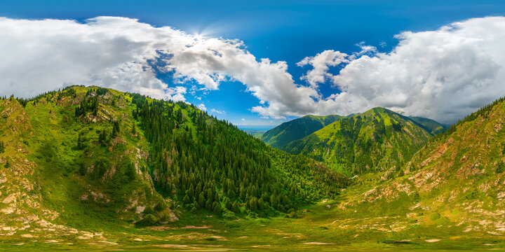 spherical aerial panorama in equirectangular projection of Majestic mountains in serene Kyrgyzstan valley