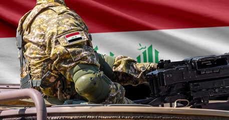 Naklejka premium Iraq flag with soldier at machinegun turret