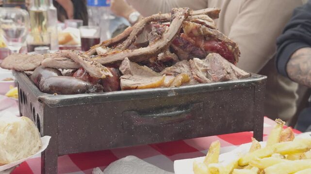 Traditional argentinean barbecue asado grilling meat platter