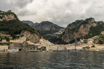 Fototapeta premium Scenic panoramic Amalfi vista in springtime under heavily overcast sky, Amalfi Coast, Campania, Southern Italy