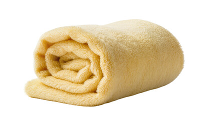 Isolated cozy yellow fluffy blanket or towel rolled neatly for ultimate comfort and softness © Niamh