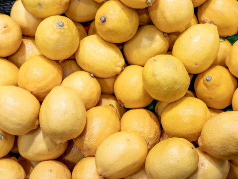 Pile of Fresh Yellow Lemons Background