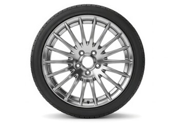 Obraz premium A close-up view of a silver alloy wheel with a black tire
