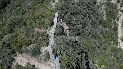 Naklejka premium Italy, Liguria, La Spezia - Monesteroli in the Cinque Terre National Park is a small, almost uninhabited village famous for its 2,200-step staircase overlooking the sea, tourist trekking walking path