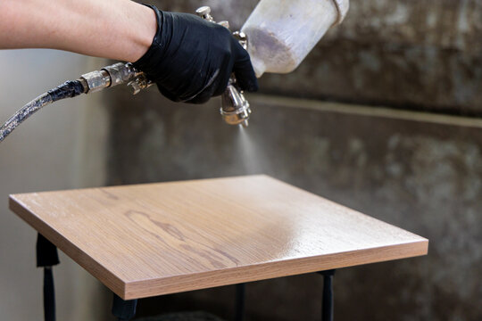 Spraying Wood Surface with Paint Gun Furniture Finishing Process
