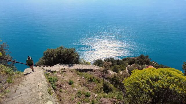 Italy, Liguria, La Spezia - Monesteroli in the Cinque Terre National Park is a small, almost uninhabited village famous for its 2,200-step staircase overlooking the sea, tourist trekking  walking path