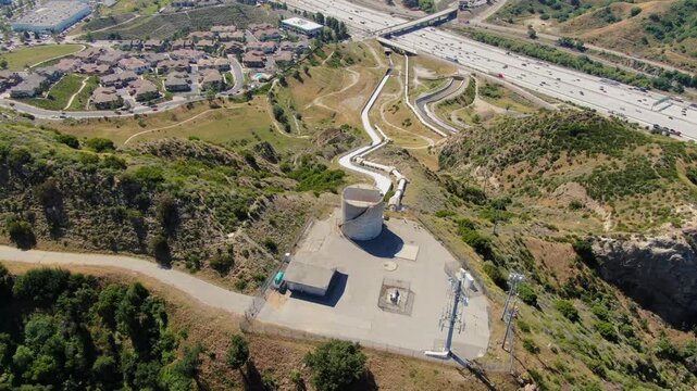 Wide Aerial View of the Los Angeles Aqueduct Cascades and Infrastructure in the Santa Clarita Foothills