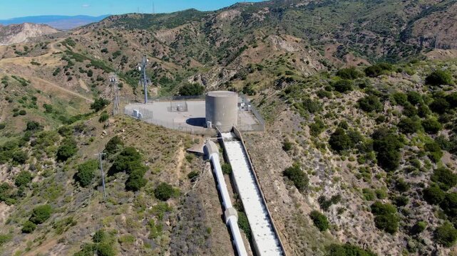 Aerial Drone View of Los Angeles Aqueduct Water Infrastructure and Surge Tank in Santa Clarita, California