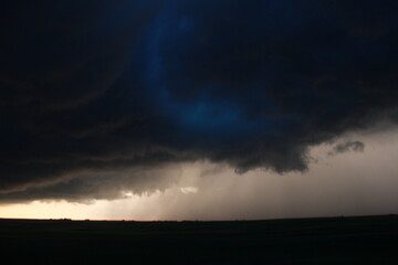 Fototapeta premium Storm with lightning and a tornado warning over the Qu'Appelle Valley.