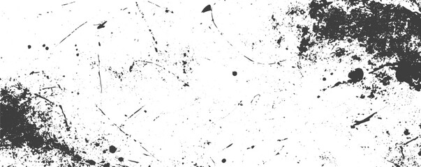 Fototapeta premium Gritty black and white grunge vector texture background with ink splatters scratches and weathered distressed elements for design overlays