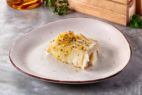 Steamed cod fish fillet with spices
