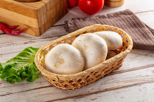 Raw white champignon mush heap