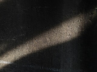 Fototapeta premium dark grunge background with shadow in the afternoon 