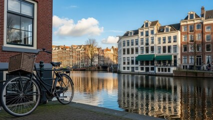 Fototapeta premium A bicycle parked beside a serene canal in a historic European city