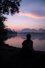 Fototapeta premium Beautiful Sunrise in the morning Glorious morning light at Baan Nong Thale, Krabi Province,Thailand