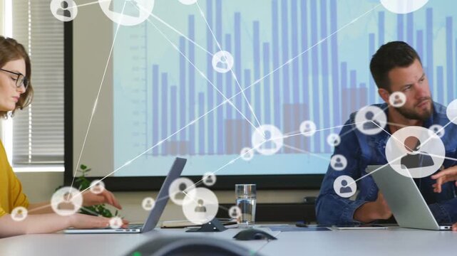 Woman typing laptop starting network overlay team leaning pointing viewing business data in meeting