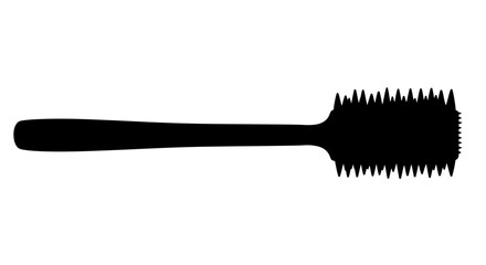 Black hair comb laying horizontally a striking silhouette © Amena