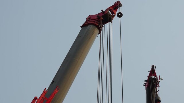 Crane machinery, equipment to lifting heavy object in construction or building operation. Industrial operation scene and equipment object.