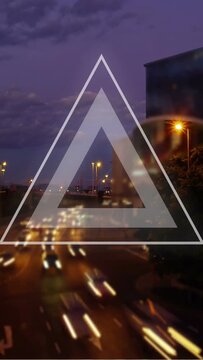Vertical video: Opening shot starting triangle overlay pulsing and fading over lights for design