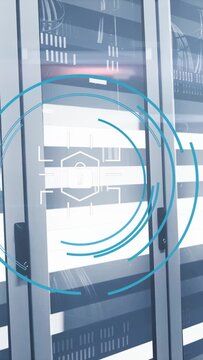 Vertical video: Server cabinet receiving HUD scan from sides, teal rings appearing, reticle locking