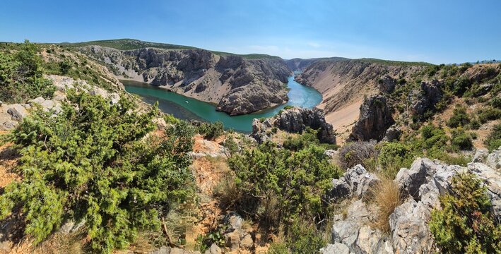 Breathtaking S-Curve of the Zrmanja Canyon River Cutting Through Towering Vertical Cliff Walls, Croatia