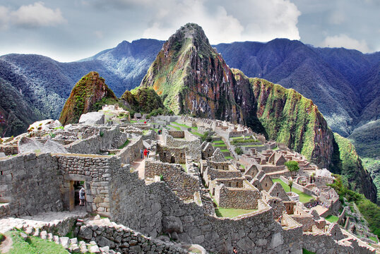 Peru Machu Picchu or Machu Pikchu Quechua machu old, old person, pikchu pyramid; mountain or prominence with a broad base which ends in sharp peaks