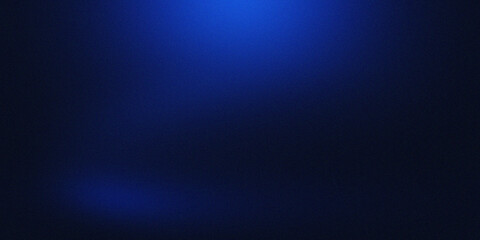 Obraz premium A dark canvas with a vibrant blue glow at the top center