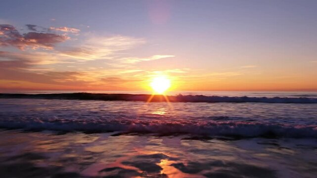 Ocean sunset with vibrant colors reflecting on water surface