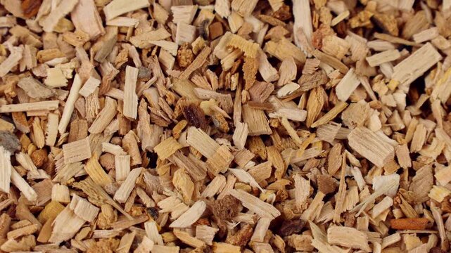 Wood alder smoking chips texture circle rotation close up top view
