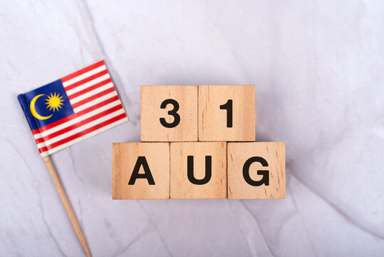 Malaysian national flag and date 31 August Independence Day concept