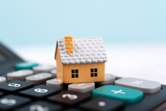 Model house and calculator business concept