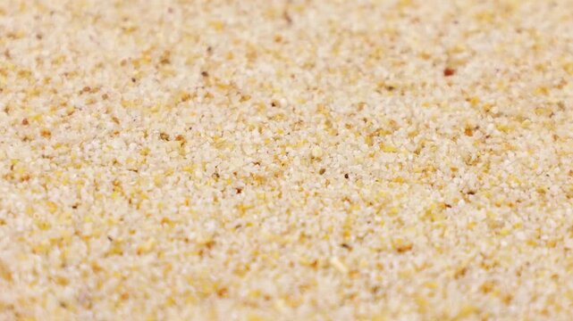Dried granulated garlic texture circle rotation close up