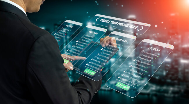 Man Selecting Digital Pricing Plan Options with Transparent Touchscreen Interface Against a Modern Cityscape Background Quark.