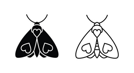 Two moths with heart shaped wing markings a striking black silhouette © Rina
