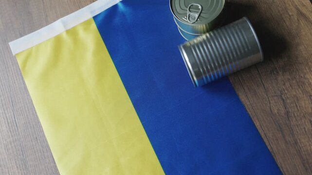 Canned Foods on Ukrainian National Flag Close-up