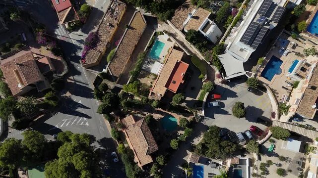 Aerial top view of villas with pools in Calpe Spain
