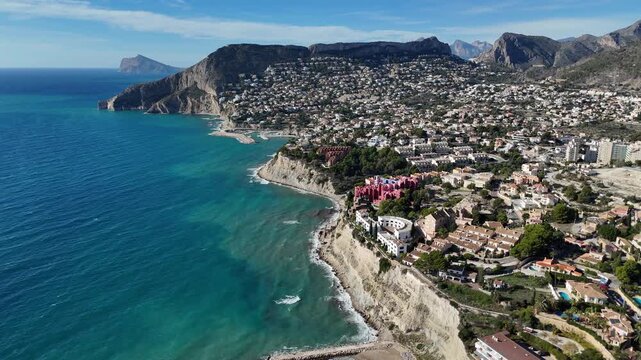 Aerial view of Calpe coastline with cliffs and city Spain