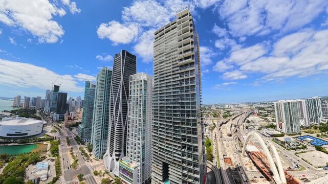 Aerial tracking shot of highrise towers in Miami