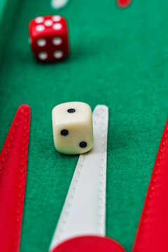 Backgammon Board Detail with Dice on Green Felt Surface game board play entertainment