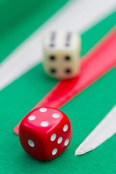 Backgammon Board Detail with Dice on Green Felt Surface game board play entertainment