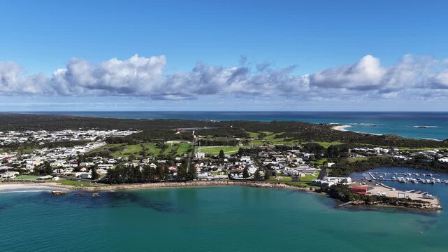 Robe, South Australia Coastline: 4K aerial drone footage of coastal town, houses and estates, marina, sandy beaches, ocean shoreline, cliffs and seaside landscape, local traffics and roads