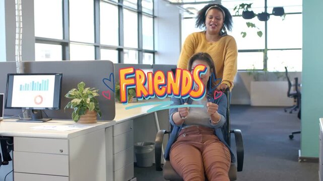 Woman pushing colleague in chair down office aisle, steering and bonding, FRIENDS graphic appearing