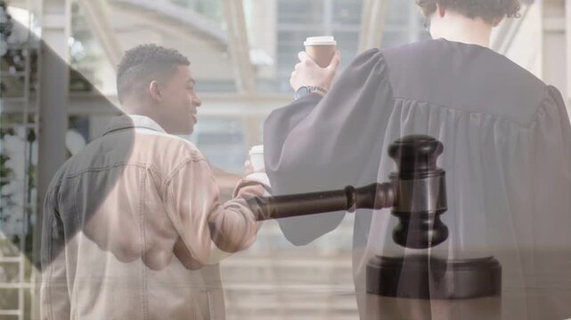 Judge and companion walking atrium exchanging cups, gavel overlay sliding over pair evoking legal