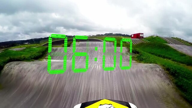 Countdown at 10:00 starting helmet camera descending ramp, taking humps, banked turn for timed run