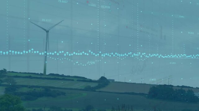Vertical video: Wind turbine rotating on horizon, data driving waveform and charts tracking power