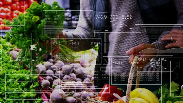 Couple selecting lettuce at market, shopper reaching in sweater holding woven basket HUD rising