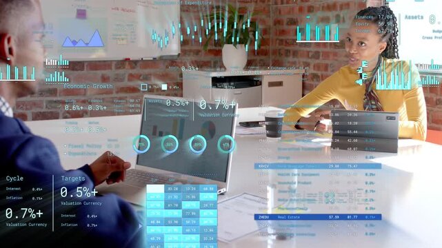 Vertical video: Man using trackpad, showing finance; overlays updating on screen, woman tapping